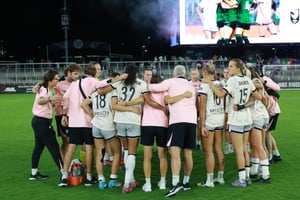 Team huddle at Racing Louisville