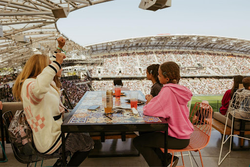 Sunset Deck Table_Premium Fans cheering