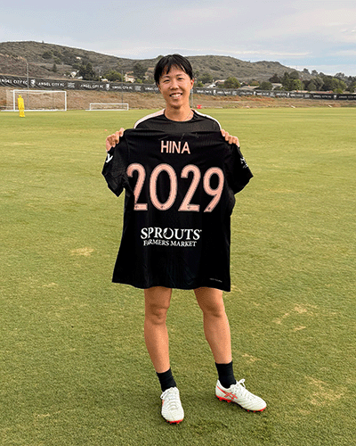 Hina Sugita holding jersey with 2029